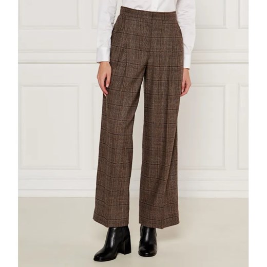 Ba&sh Spodnie CADWIN | flare fit | z dodatkiem wełny ze sklepu Gomez Fashion Store w kategorii Spodnie damskie - zdjęcie 184512616