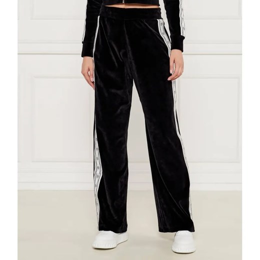 HUGO Spodnie dresowe Narhysan | flare fit ze sklepu Gomez Fashion Store w kategorii Spodnie damskie - zdjęcie 184513908