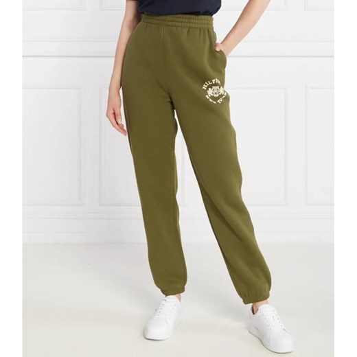 Tommy Hilfiger Spodnie dresowe VARSITY FLOCK | Relaxed fit ze sklepu Gomez Fashion Store w kategorii Spodnie damskie - zdjęcie 184515257