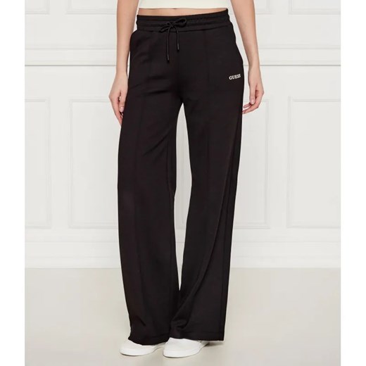 GUESS ACTIVE Spodnie dresowe CARMEN | Loose fit ze sklepu Gomez Fashion Store w kategorii Spodnie damskie - zdjęcie 184516207