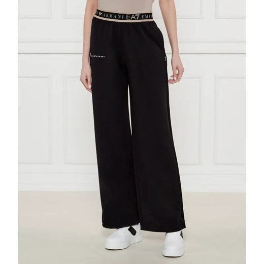 EA7 Spodnie dresowe | flare fit ze sklepu Gomez Fashion Store w kategorii Spodnie damskie - zdjęcie 184517428