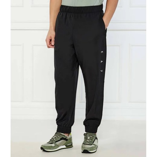 EA7 Spodnie dresowe | Modern fit ze sklepu Gomez Fashion Store w kategorii Spodnie męskie - zdjęcie 184519259