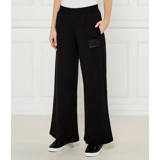 EA7 Spodnie dresowe | flare fit ze sklepu Gomez Fashion Store w kategorii Spodnie damskie - zdjęcie 184519976