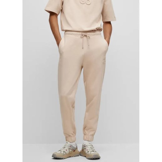 HUGO Spodnie dresowe Dchard | Regular Fit ze sklepu Gomez Fashion Store w kategorii Spodnie męskie - zdjęcie 184520437