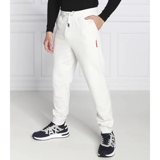 GUESS Spodnie dresowe Adam | Regular Fit ze sklepu Gomez Fashion Store w kategorii Spodnie męskie - zdjęcie 184521928