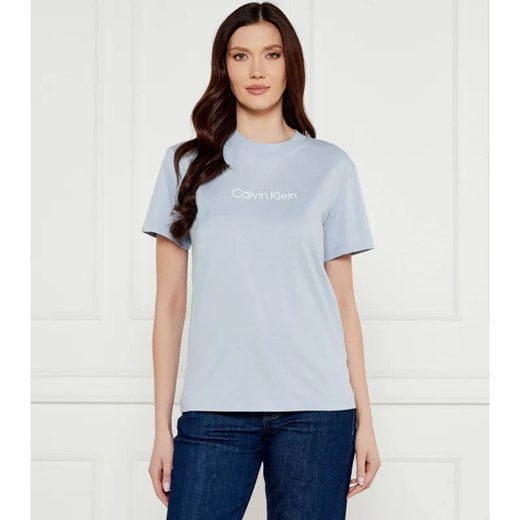 Calvin Klein T-shirt HERO LOGO | Regular Fit ze sklepu Gomez Fashion Store w kategorii Bluzki damskie - zdjęcie 184526517