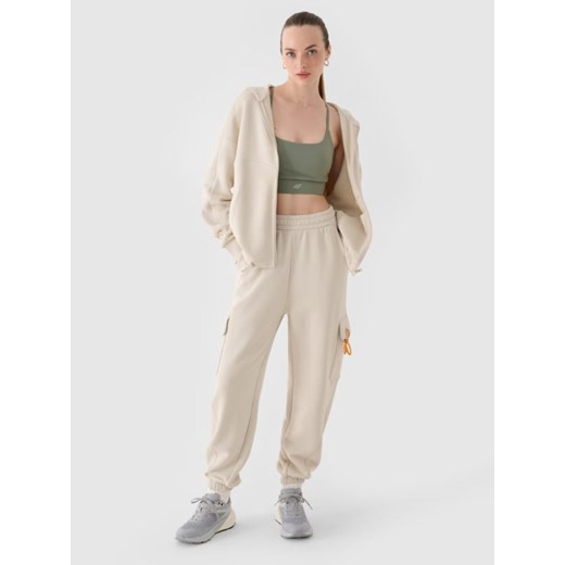 Damskie spodnie dresowe joggery 4F 4FRAW24TTROF1353 - beżowe ze sklepu Sportstylestory.com w kategorii Spodnie damskie - zdjęcie 184547695
