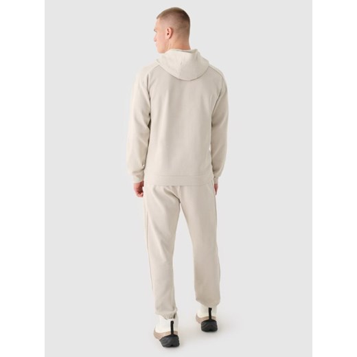 Męskie spodnie dresowe joggery 4F 4FRAW24TTROM1348 - beżowe M Sportstylestory.com wyprzedaż