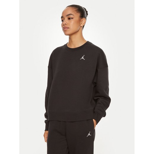 Nike Bluza Brooklyn FN4491 Czarny Relaxed Fit ze sklepu MODIVO w kategorii Bluzy damskie - zdjęcie 184560728