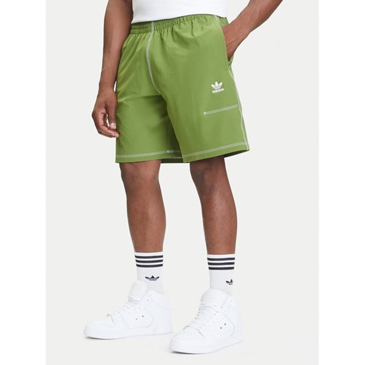 adidas Szorty sportowe Trefoil Essentials KA8540 Zielony Loose Fit ze sklepu MODIVO w kategorii Spodenki męskie - zdjęcie 184562229