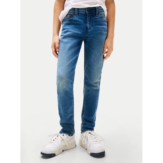 Tommy Hilfiger Jeansy Scanton KB0KB09709 Niebieski Slim Fit ze sklepu MODIVO w kategorii Spodnie chłopięce - zdjęcie 184562287