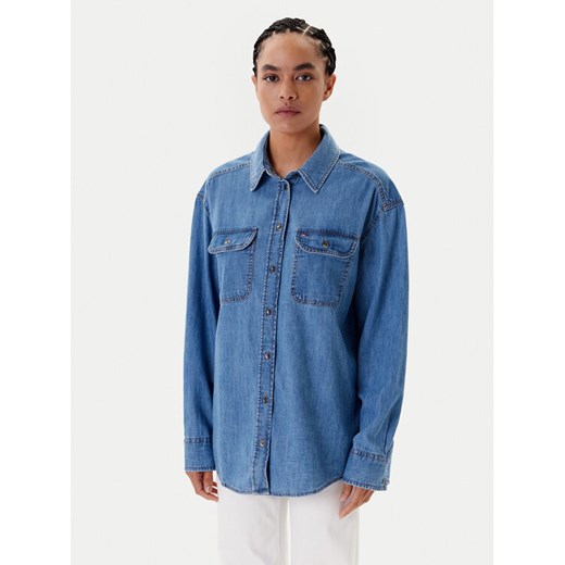 Tommy Jeans Koszula jeansowa DW0DW21073 Niebieski Relaxed Fit ze sklepu MODIVO w kategorii Koszule damskie - zdjęcie 184565105