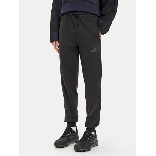 adidas Spodnie dresowe Z.N.E. JE7842 Czarny Regular Fit ze sklepu MODIVO w kategorii Spodnie damskie - zdjęcie 184578945