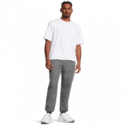 Męskie spodnie treningowe Under Armour UA Unstoppable Joggers - szare ze sklepu Sportstylestory.com w kategorii Spodnie męskie - zdjęcie 184580837