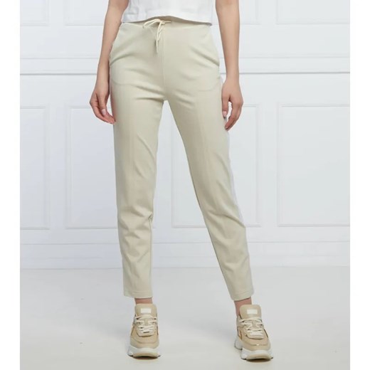 Calvin Klein Jeans Spodnie dresowe MILANO | Regular Fit | stretch ze sklepu Gomez Fashion Store w kategorii Spodnie damskie - zdjęcie 184590025