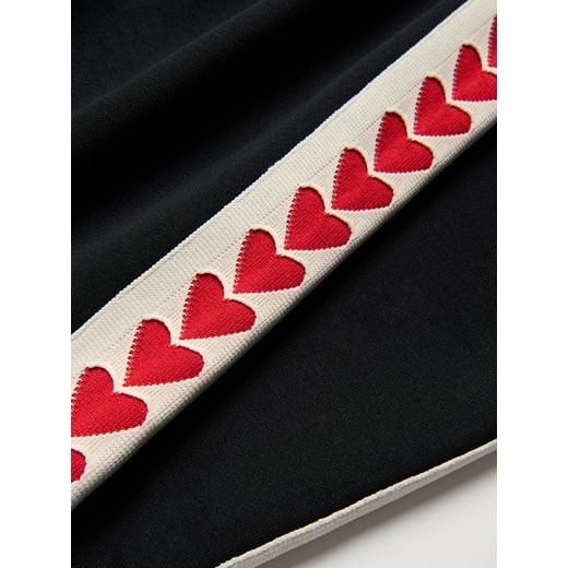 Reserved - Szerokie spodnie z lampasem - czarny Reserved 134 (8 lat) Reserved