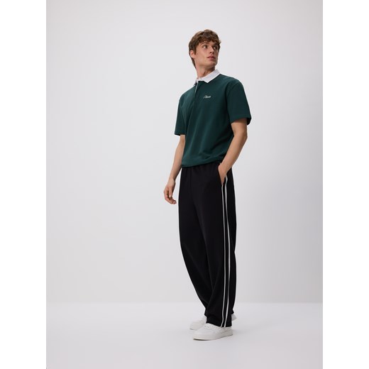 Reserved - Spodnie loose fit - granatowy Reserved M Reserved