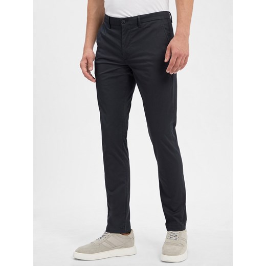 Tommy Hilfiger Chino - Bleecker Slim Fit Mężczyźni Bawełna granatowy wzorzysty ze sklepu vangraaf w kategorii Spodnie męskie - zdjęcie 184655056