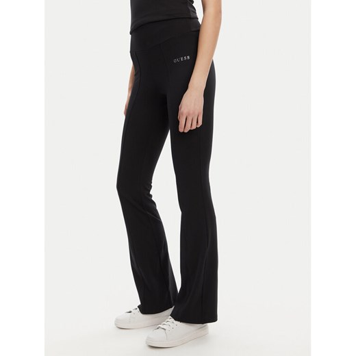 Guess Spodnie dresowe V5RB15 KCD02 Czarny Regular Fit ze sklepu MODIVO w kategorii Spodnie damskie - zdjęcie 184663419