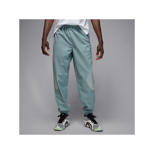 Męskie spodnie do rozgrzewki Jordan Sport JAM - Szary ze sklepu Nike poland w kategorii Spodnie męskie - zdjęcie 184669775