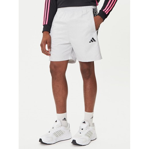 adidas Szorty sportowe Common Goal JW0239 Szary Regular Fit ze sklepu MODIVO w kategorii Spodenki męskie - zdjęcie 184672796