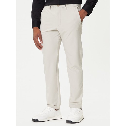 BOSS Spodnie materiałowe T_Commuter 50534303 Beżowy Slim Fit ze sklepu MODIVO w kategorii Spodnie męskie - zdjęcie 184681849