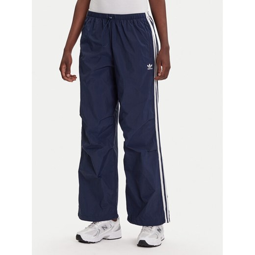 adidas Spodnie dresowe 3-Stripes JD3127 Granatowy Loose Fit ze sklepu MODIVO w kategorii Spodnie damskie - zdjęcie 184681858