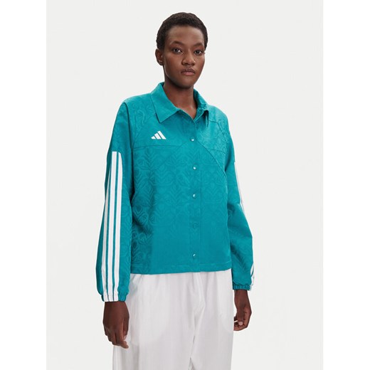 adidas Kurtka przejściowa Tiro x Common Goal Coaches JL9204 Turkusowy Loose Fit ze sklepu MODIVO w kategorii Kurtki damskie - zdjęcie 184686779