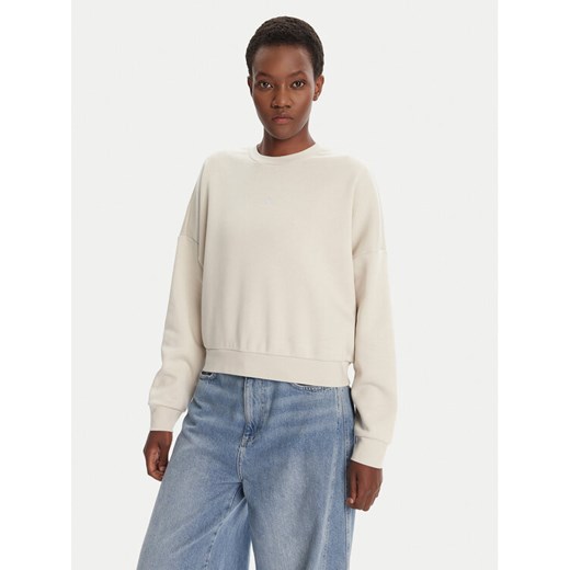 adidas Bluza Essentials Small Logo Feelcozy JI6069 Beżowy Loose Fit ze sklepu MODIVO w kategorii Bluzy damskie - zdjęcie 184706726