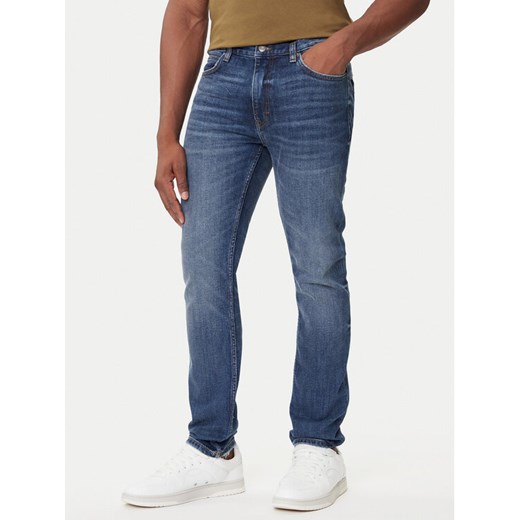 HUGO Jeansy 50542688 Niebieski Extra Slim Fit ze sklepu MODIVO w kategorii Jeansy męskie - zdjęcie 184706776