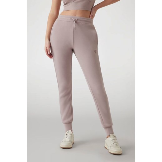 GUESS Dresowe damskie spodnie w kolorze taupe Allie Scuba, Rozmiar XS ze sklepu outfit.pl w kategorii Spodnie damskie - zdjęcie 184734266