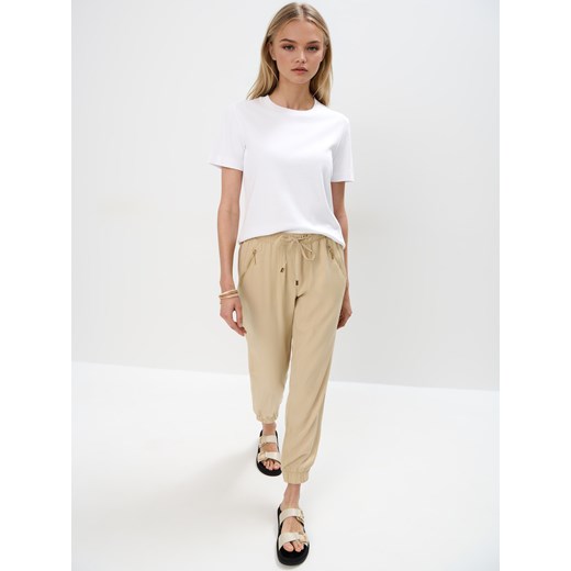 Mohito - Beżowe spodnie joggery - beżowy Mohito 38 Mohito
