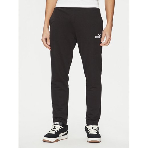 Puma Spodnie dresowe Ess No. 1 Logo 682612 Czarny Regular Fit ze sklepu MODIVO w kategorii Spodnie męskie - zdjęcie 184741326