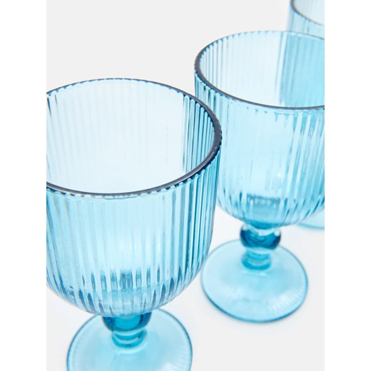 Sinsay - Ryflowane szklanki na nóżce 4 pack - niebieski Sinsay One Size Sinsay
