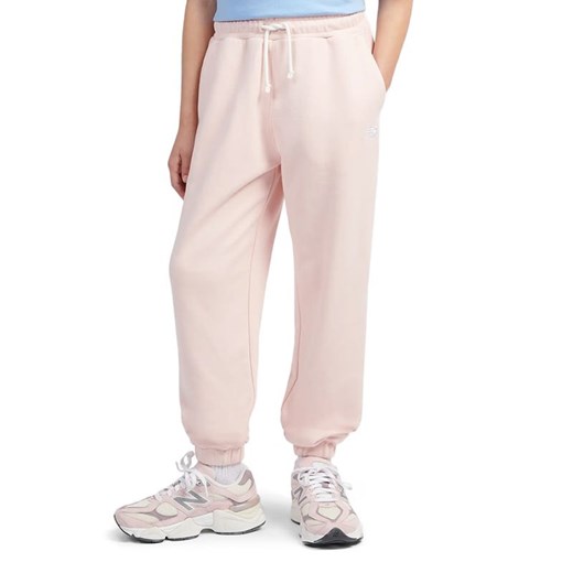 Spodnie dziecięce New Balance LAKG0058PIE - różowe ze sklepu streetstyle24.pl w kategorii Spodnie dziewczęce - zdjęcie 184789976