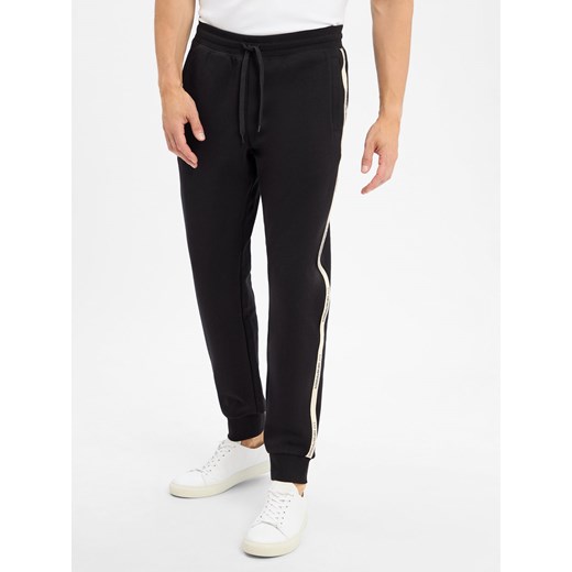 EA7 Emporio Armani Męskie spodnie do biegania Mężczyźni Bawełna czarny jednolity ze sklepu vangraaf w kategorii Spodnie męskie - zdjęcie 184791149