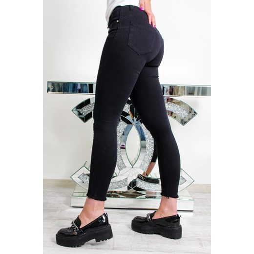 CZARNE SPODNIE  TYPU PUSH UP Z SZARPANĄ NOGAWKĄ Olika S olika.com.pl