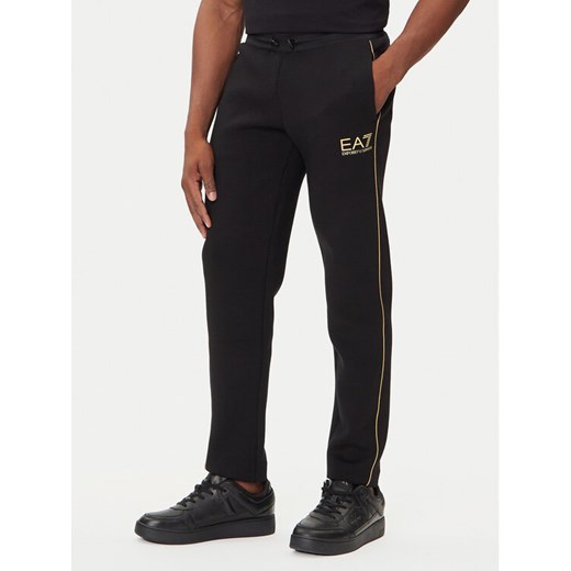 EA7 Emporio Armani Spodnie dresowe 7M000672 AF14146 UC001 Czarny Slim Fit ze sklepu MODIVO w kategorii Spodnie męskie - zdjęcie 184812876