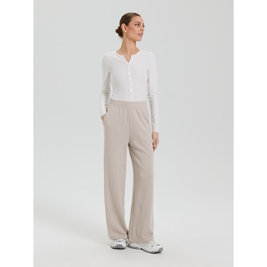 Sinsay - Spodnie z szeroką nogawką - beżowy Sinsay XS Sinsay