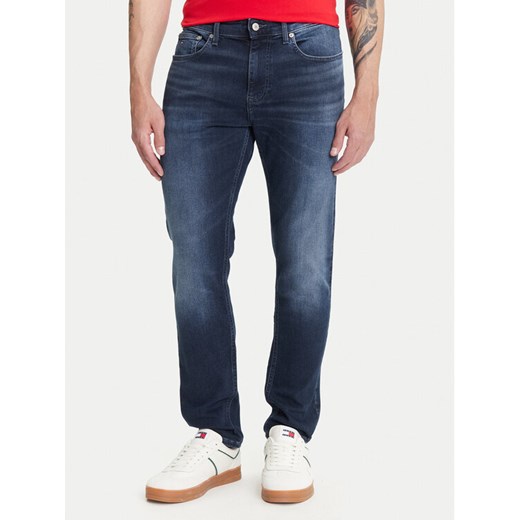 Tommy Jeans Jeansy Austin DM0DM21901 Granatowy Slim Fit ze sklepu MODIVO w kategorii Jeansy męskie - zdjęcie 184906086