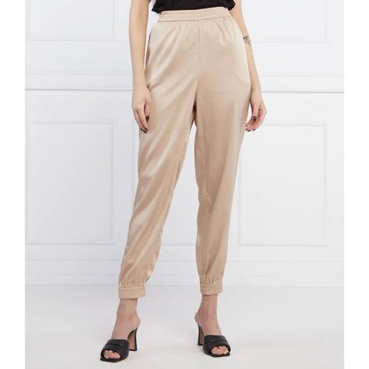GUESS Spodnie JAY | Loose fit ze sklepu Gomez Fashion Store w kategorii Spodnie damskie - zdjęcie 184947276