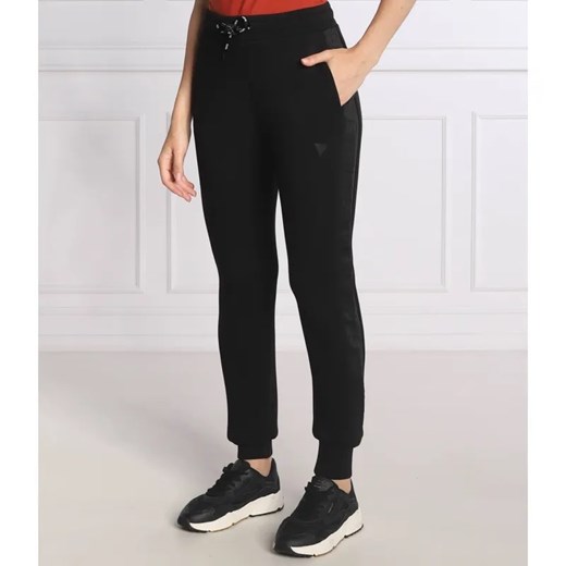 GUESS ACTIVE Spodnie dresowe ALLIE | Regular Fit ze sklepu Gomez Fashion Store w kategorii Spodnie damskie - zdjęcie 184947349