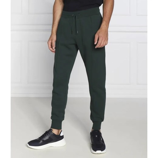 Tommy Hilfiger Spodnie dresowe | Regular Fit ze sklepu Gomez Fashion Store w kategorii Spodnie męskie - zdjęcie 184948388