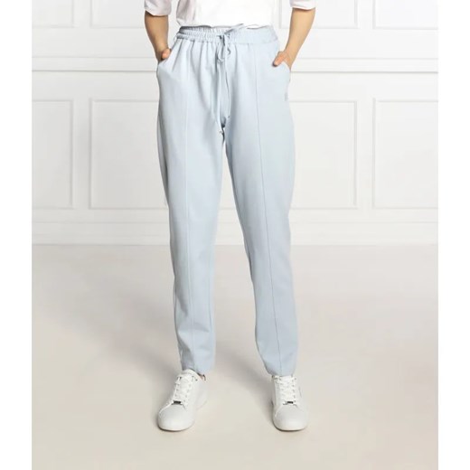 Tommy Hilfiger Spodnie dresowe | Regular Fit ze sklepu Gomez Fashion Store w kategorii Spodnie damskie - zdjęcie 184948469