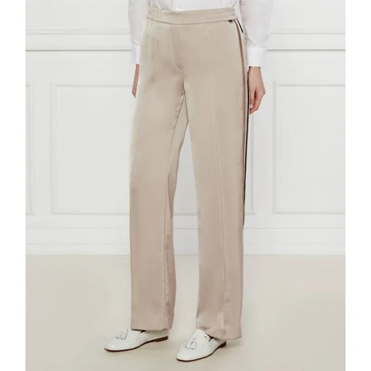 Marc Cain Satynowe spodnie Washington | flare fit ze sklepu Gomez Fashion Store w kategorii Spodnie damskie - zdjęcie 185002977
