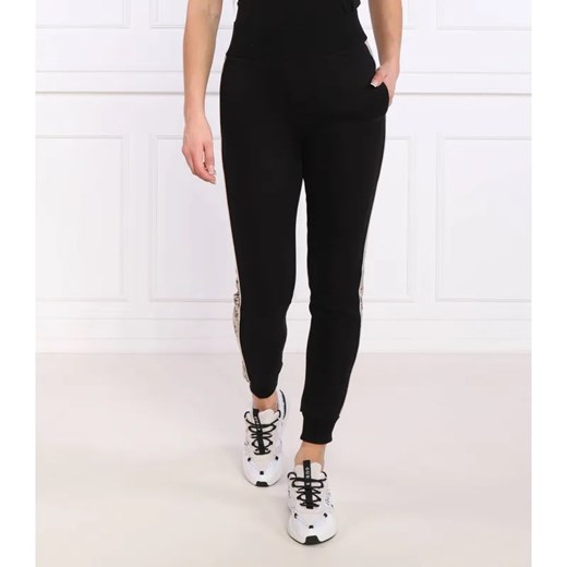 GUESS ACTIVE Spodnie dresowe BRITNEY | Regular Fit ze sklepu Gomez Fashion Store w kategorii Spodnie damskie - zdjęcie 185003639
