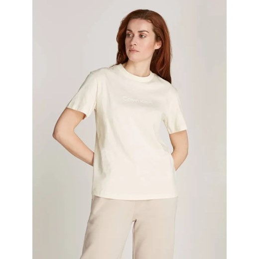 Calvin Klein T-shirt HERO LOGO | Regular Fit ze sklepu Gomez Fashion Store w kategorii Bluzki damskie - zdjęcie 185005138