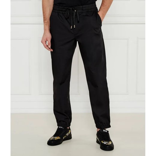 Versace Jeans Couture Spodnie jogger | Regular Fit ze sklepu Gomez Fashion Store w kategorii Spodnie męskie - zdjęcie 185005465