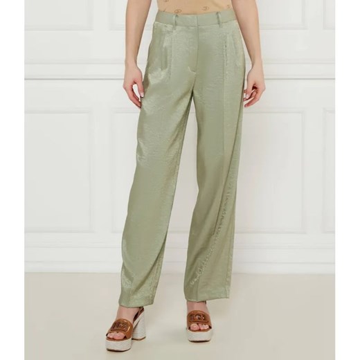 GUESS Spodnie CAMILLE | flare fit ze sklepu Gomez Fashion Store w kategorii Spodnie damskie - zdjęcie 185007039
