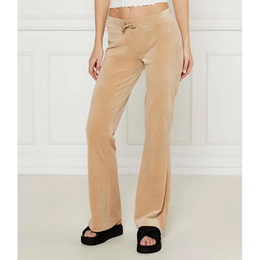 Juicy Couture Spodnie dresowe CHRISTINE | flare fit | low rise ze sklepu Gomez Fashion Store w kategorii Spodnie damskie - zdjęcie 185008025